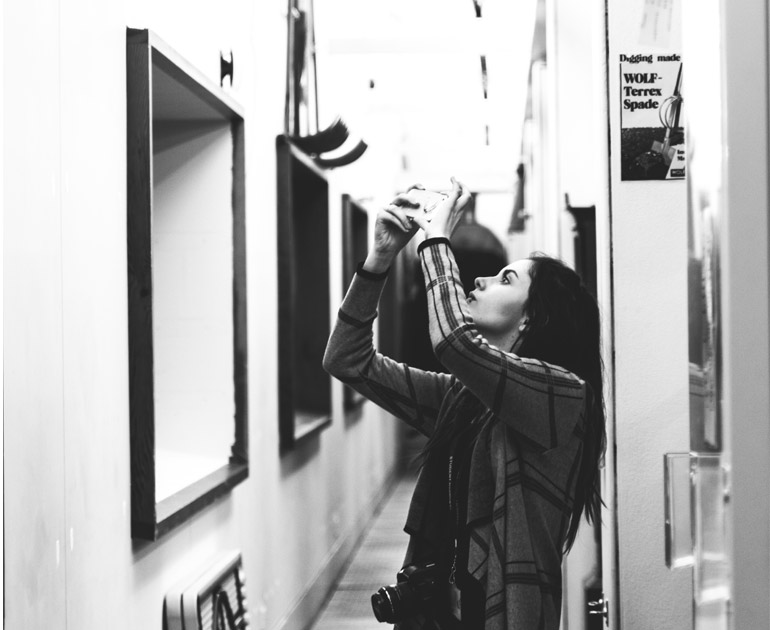 A student from Reading College photographing the MERL collections in one of our community projects.