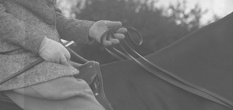Black and white photograph of a woman sitting on a horse for the MERL seminar on William Cobbett and Rural Rides.