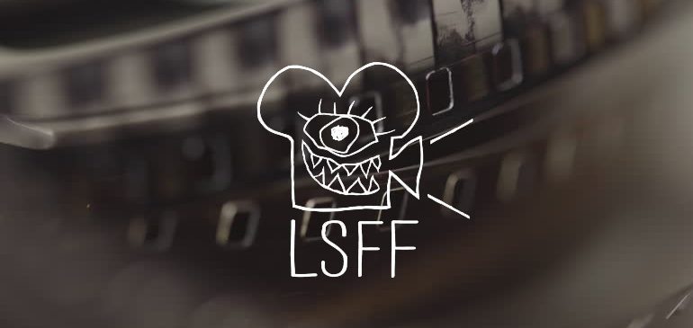 A macro image of a film reel with the London Short Film Festival logo on top, for the Reading on Thames Festival Film Trail