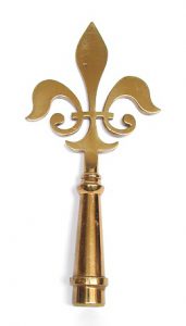 Brass polehead fleur de lys from Jardine collection of poleheads