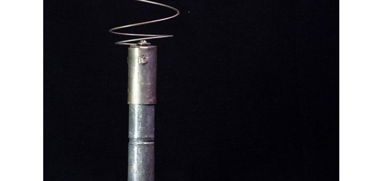 A gentle harvester - a metal handle with spiral wire attached