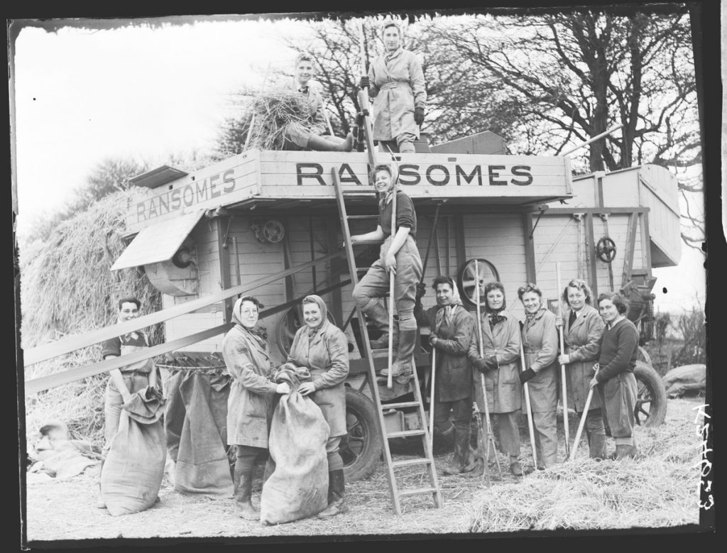 Women's Land Army threshing team in Kent