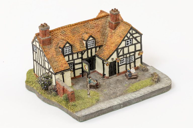 Aerial view of small ceramic model of mock Tudor public house