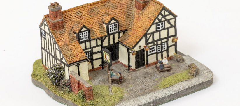 Aerial view of small ceramic model of mock Tudor public house