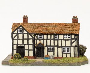 Side view of small ceramic model of mock Tudor public house