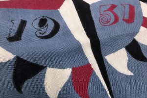 Blue, red, and white textile with Festival of Britain logo