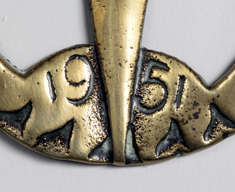 Detail of Armac Brassworks, Festival of Britain horse brass showing date '1951'