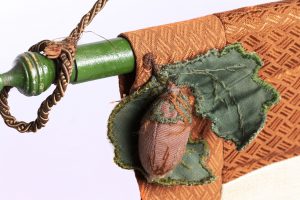 Detail of textile acorn and oak leaves from Pinkneys Green Women’s Institute Banner, circa 1951 (MERL 2007/48/1-2)