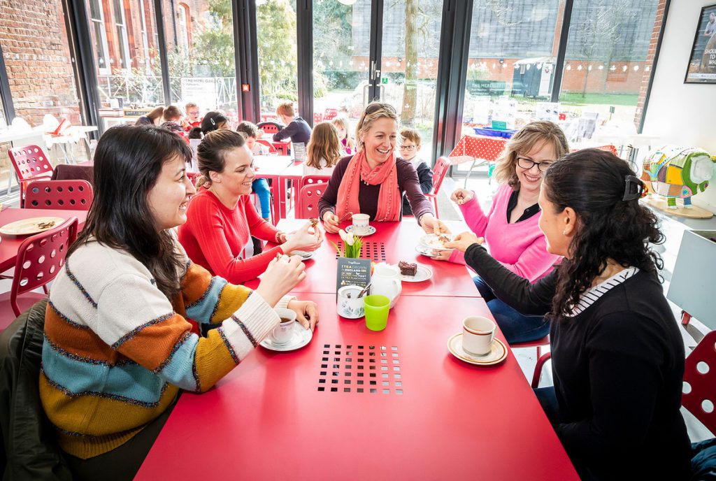 A group of visitors in The MERL café.