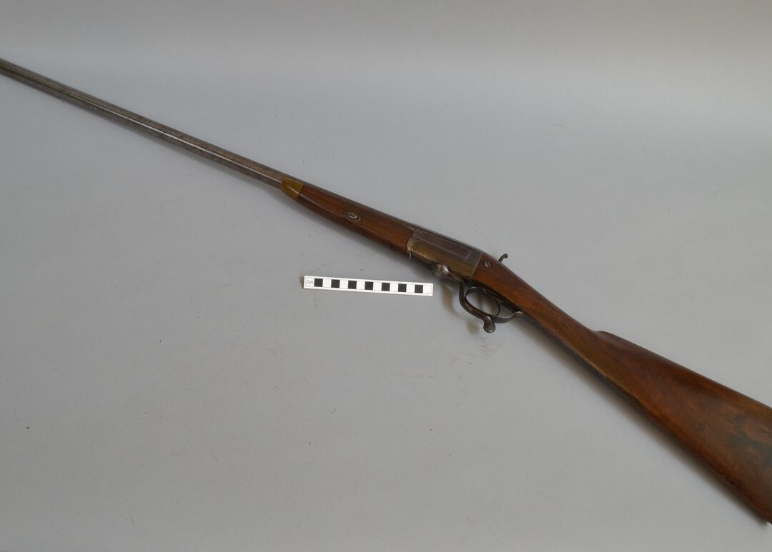 single-barrel-shotgun This single-barrel shotgun was used by a gamekeeper from around 1914. The lock plate bears the inscription 'G E Walker from Purdeys'. The stock has the initials AH crudely inscribed on one side. The Damascus barrel has been 'browned' to bring out the pattern in the metal.