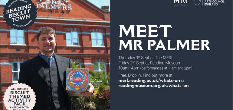A man dressed as a Victorian Mr Palmer holding a biscuit tin standing in front of the Huntley & Palmers building in Reading