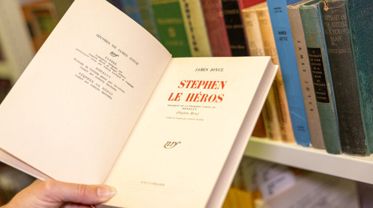 Stephen Le Heros by James Joyce, open to title page, surrounded by other books from the Solange and Stephen James Joyce Collection.