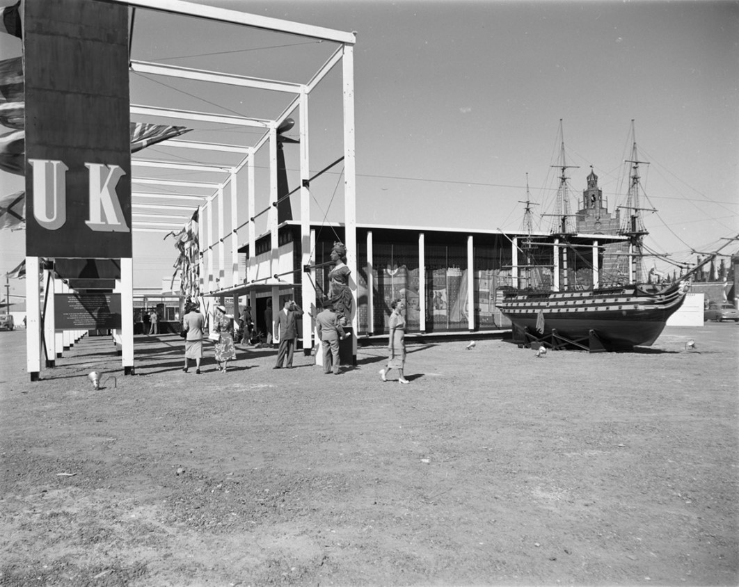 A model of HMS Victory and a ship’s figurehead in the United Kingdom Pavilion, Van Riebeeck Festival Fair, 1952. Photograph produced by Bryan Heseltine (Copyright Pitt Rivers Museum, University of Oxford, PRM 2022.1.47)