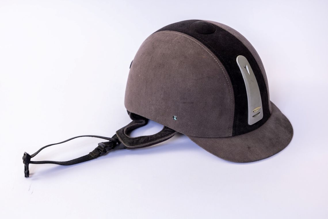 Image of a grey riding helmet