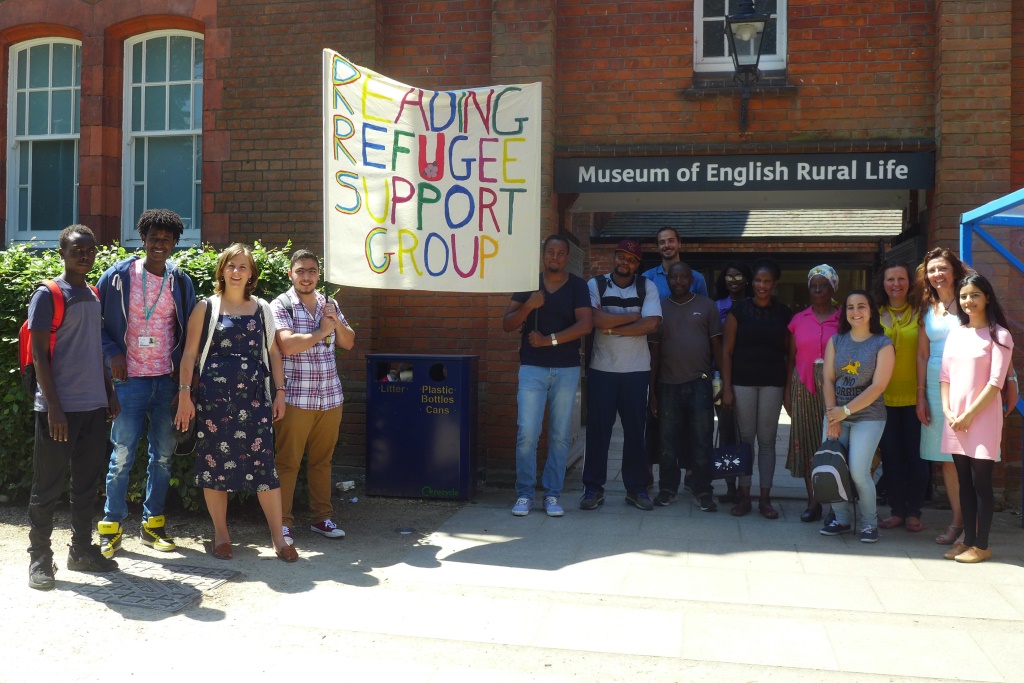 a group from the Reading Refugee Group stand outside the musem