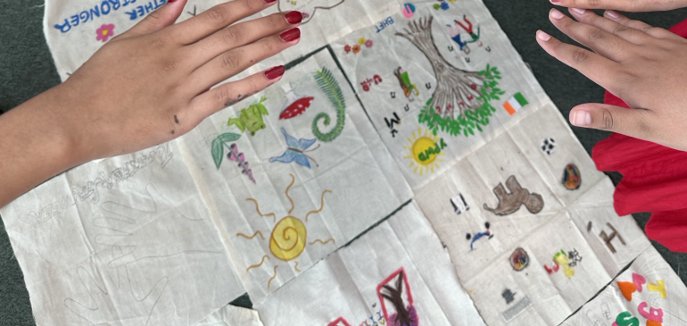 Hands over an artwork