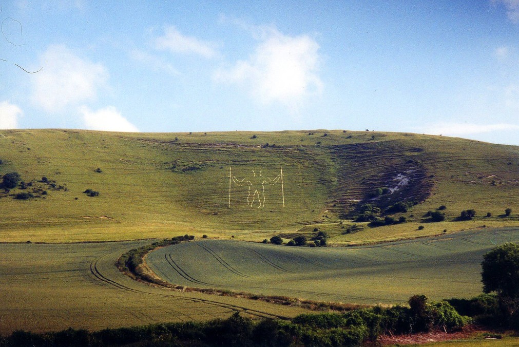 A hillside, featuring a large etching of a long man