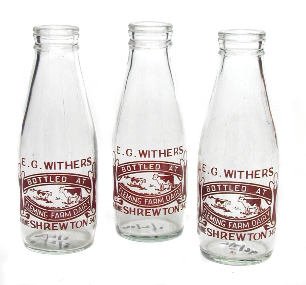 Three glass pint milk bottle
