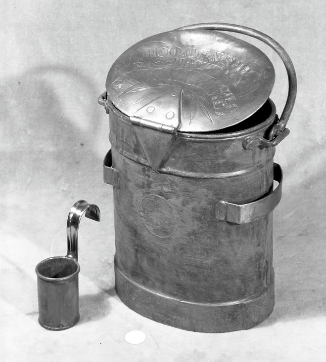 metal can with small metal cup with handle for measuring milk