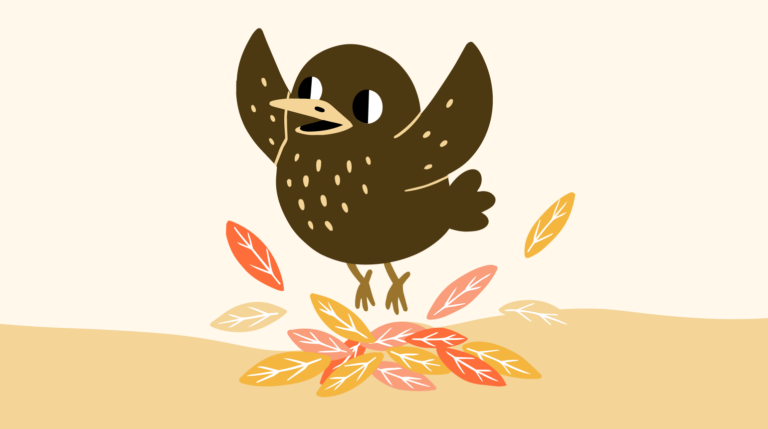 A fledgling in the garden, jumping on leaves
