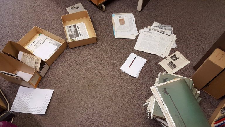 An image of cuttings laid out on an office floor.