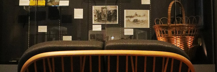 A view over the sofa of the display case for the Wellbeing in the Countryside exhibition.