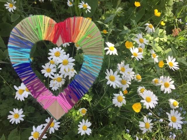 Craft heart frame with daisies