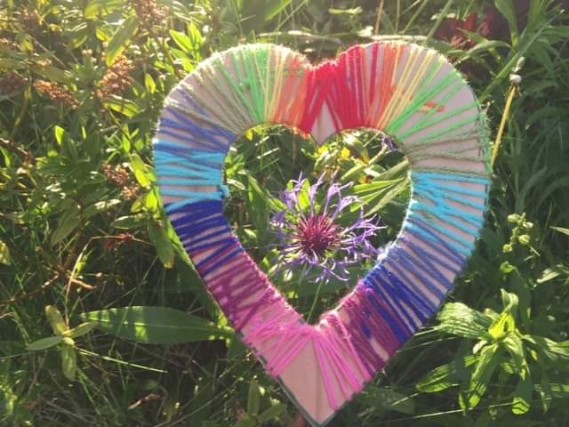 Craft heart frame with purple flower and leaves