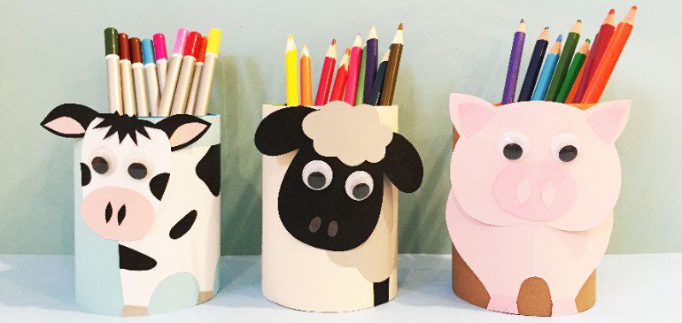 Three pencil pots: cow, sheep, pig