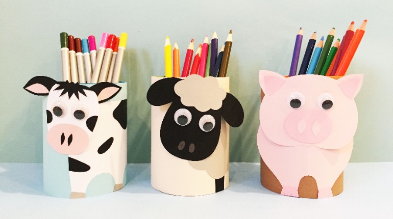 Three pencil pots: cow, sheep, pig