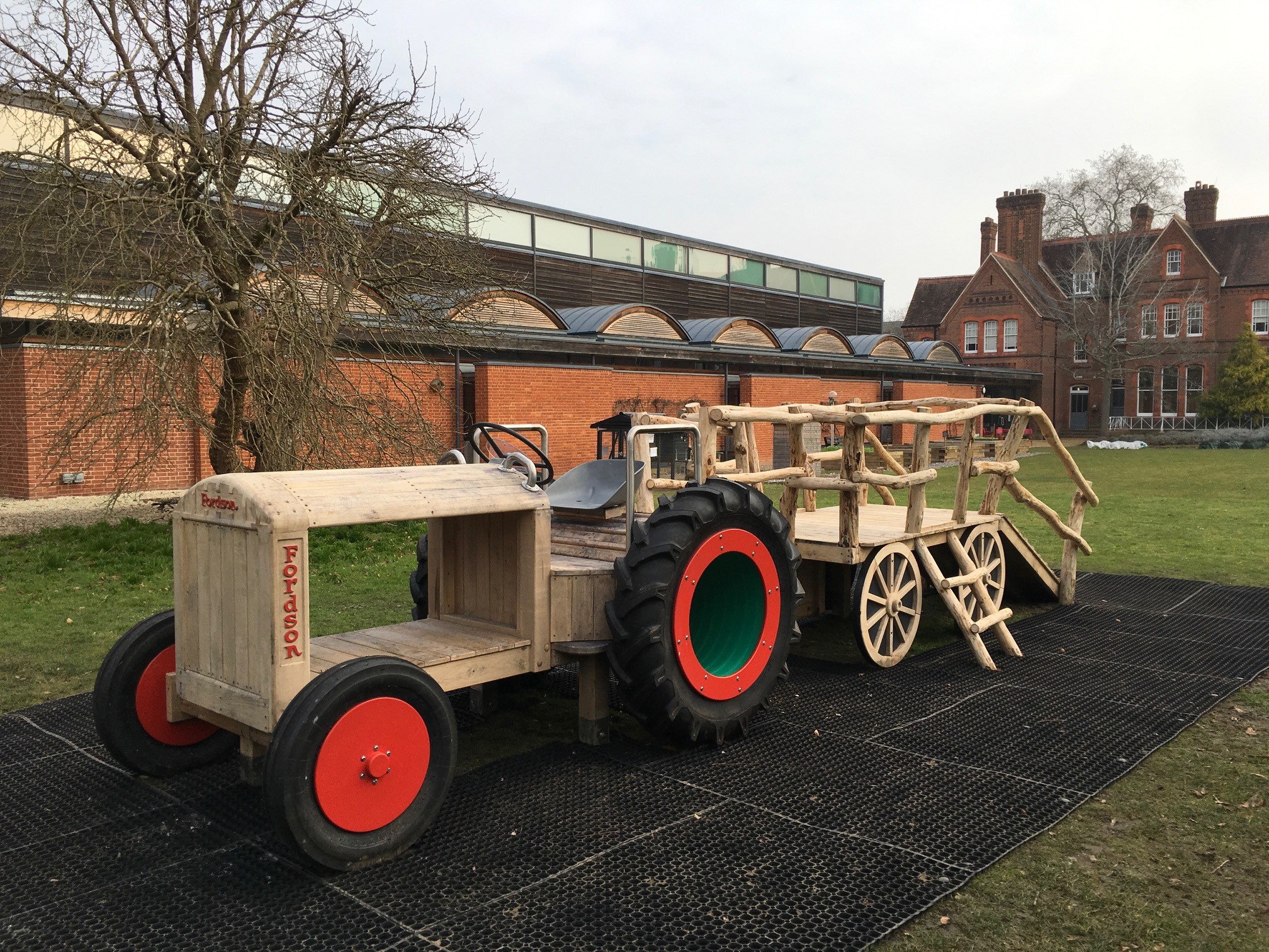 The play tractor and wagon in the MERL garden