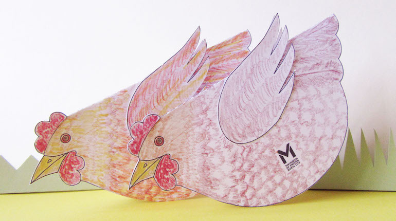 Two hens made out of card coloured in pencil