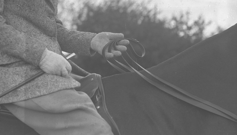 Black and white photograph of a woman sitting on a horse for the MERL seminar on William Cobbett and Rural Rides.