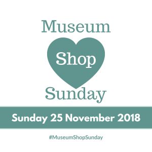 Museum Shop Sunday logo with the word Shop in white against a sage green heart shape
