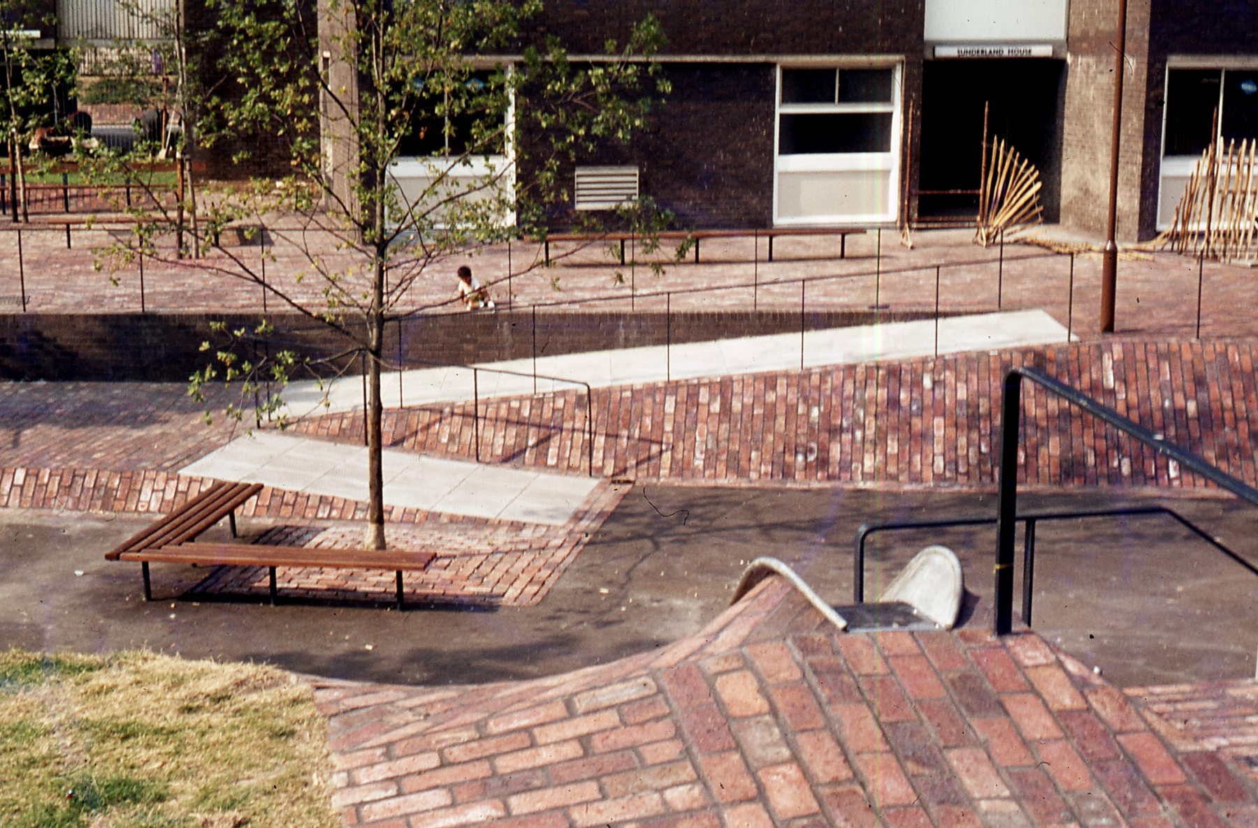 Mult-level brick-surfaced play area at Brunel Estate, around 1974