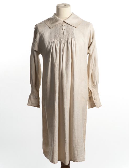 White linen smock shown front on