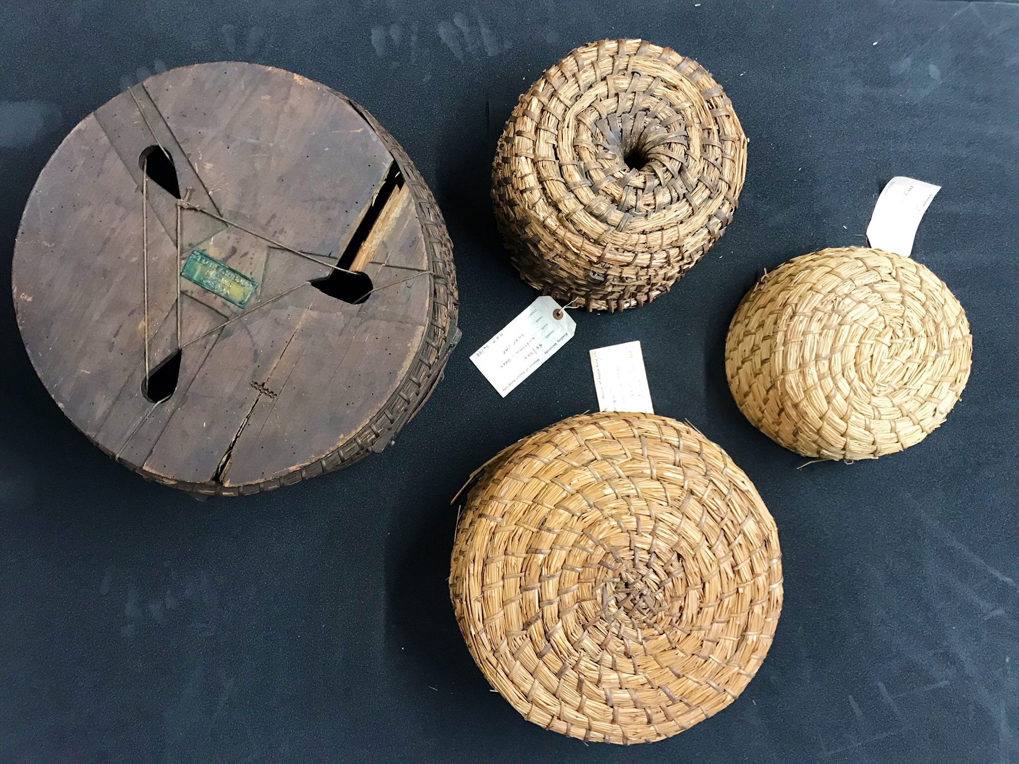 Four round bee skeps viewed from above