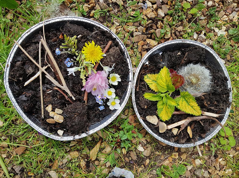 2 mud pies decorated with flowers and leaves