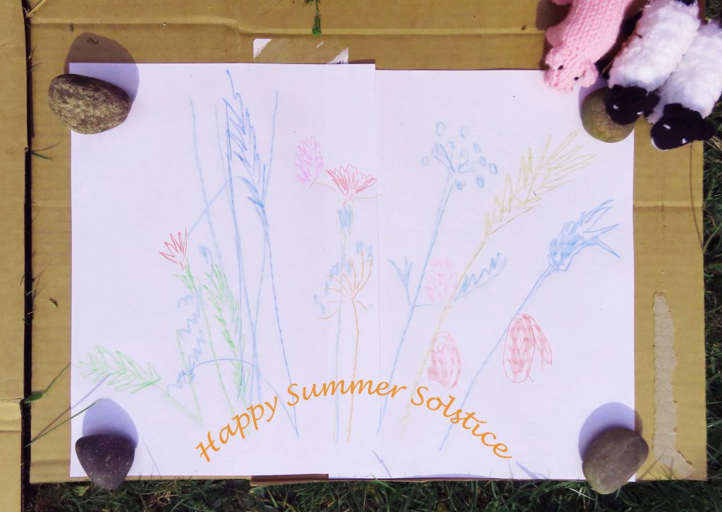 'Happy summer solstice' written over shadow art