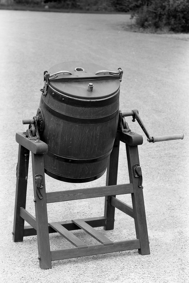 This butter churn was used for making butter, and is of a type generally used in larger dairies. It is inscribed: 'Champion churn used by the champion butter makers of England and Scotland'. (MERL 56/359)