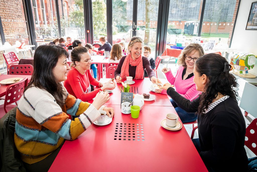 A group of visitors in The MERL café. 