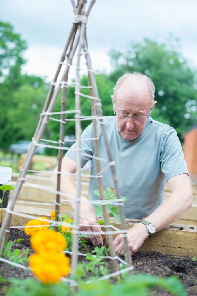 A gardening volunteer working at The MERL.