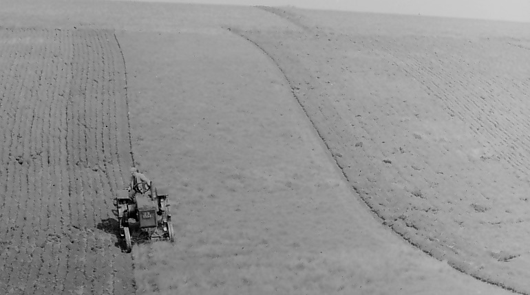 Ploughing field with a tractor