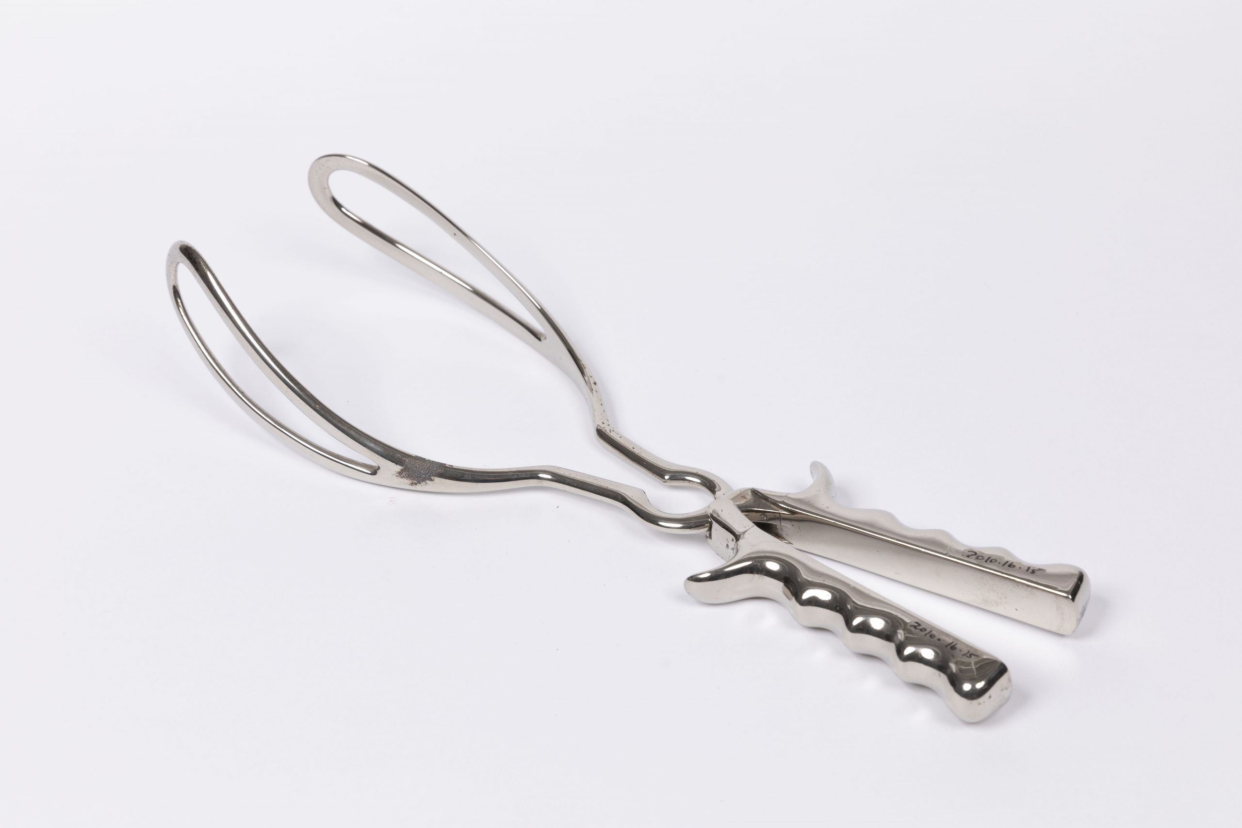 Stainless steel obstetric forceps, 1950s.