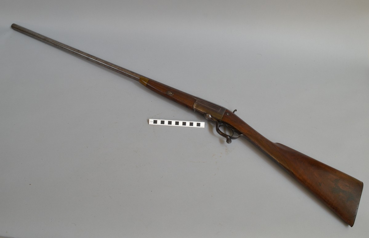 This single-barrel shotgun was used by a gamekeeper from around 1914. The lock plate bears the inscription 'G E Walker from Purdeys'. The stock has the initials AH crudely inscribed on one side. The Damascus barrel has been 'browned' to bring out the pattern in the metal.