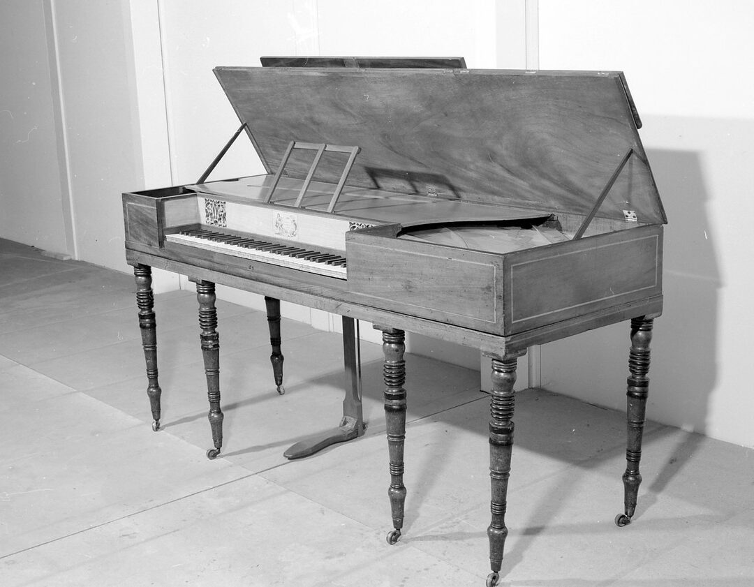 This ‘square grand’ piano was made in 1815 and used throughout the 19th century. Perhaps it livened up a servants’ ball or two in its time? (61/215)