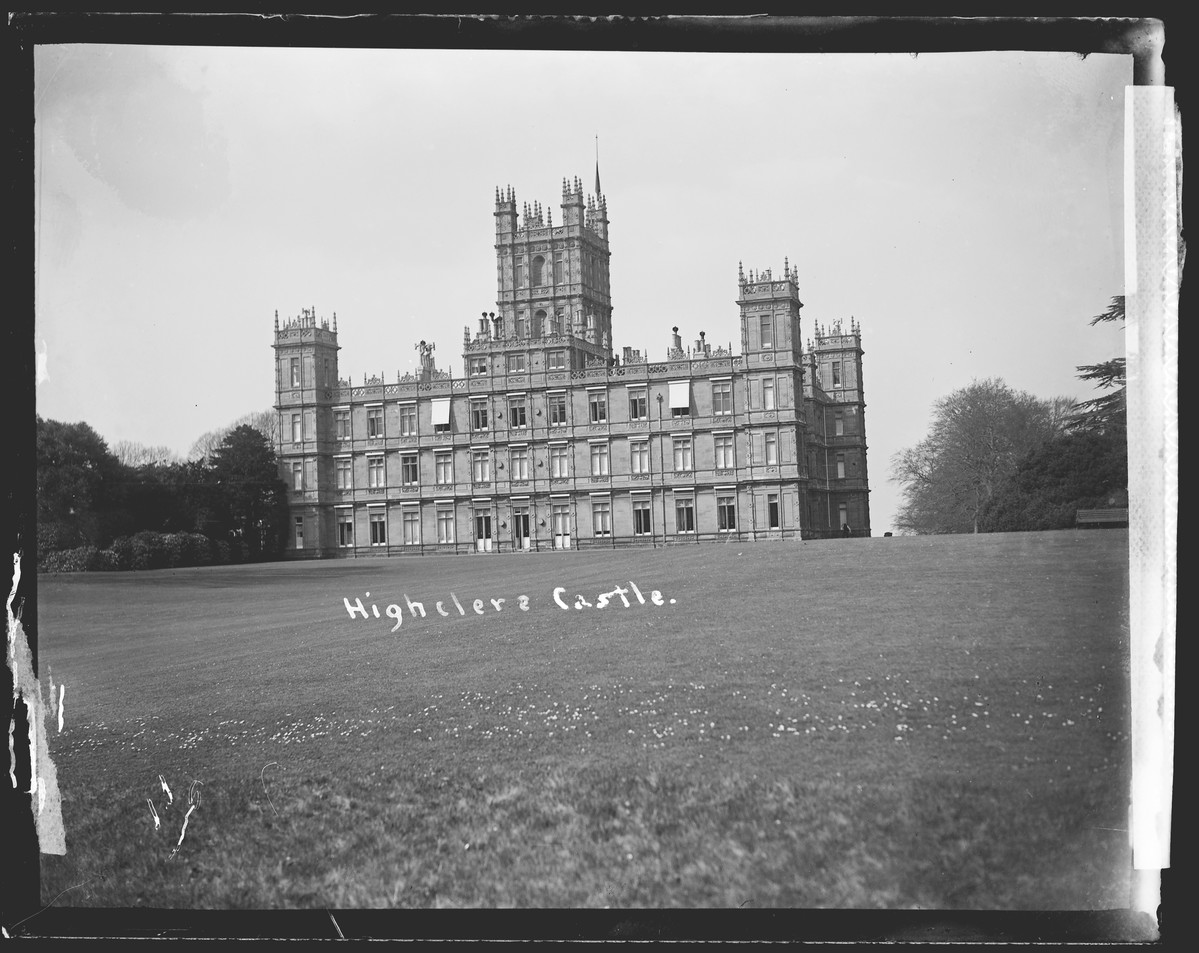 This photograph, taken in the early 20th century by Philip Collier, shows the exterior of Highclere castle, where Downton would later be filmed.