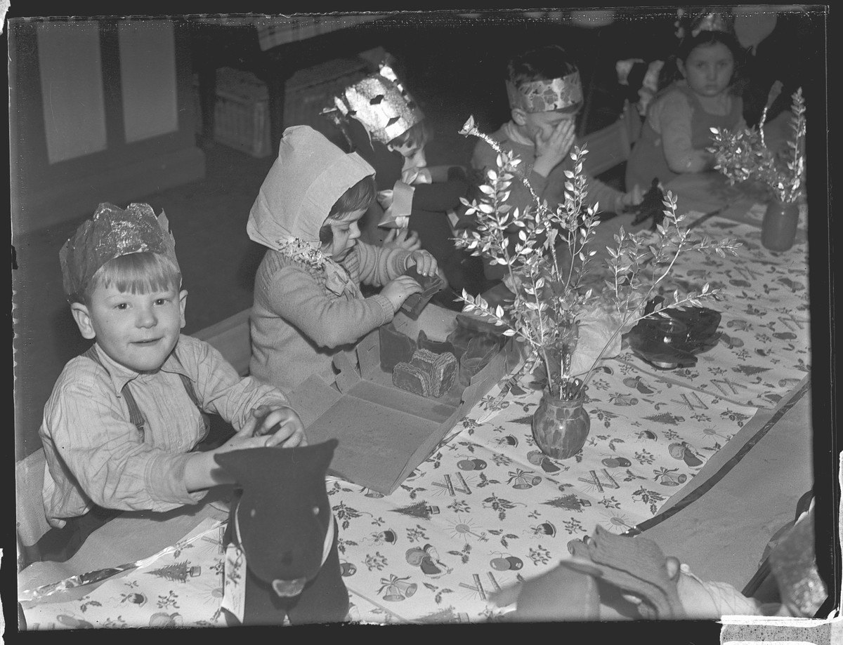 A photo of children at a Christmas party.