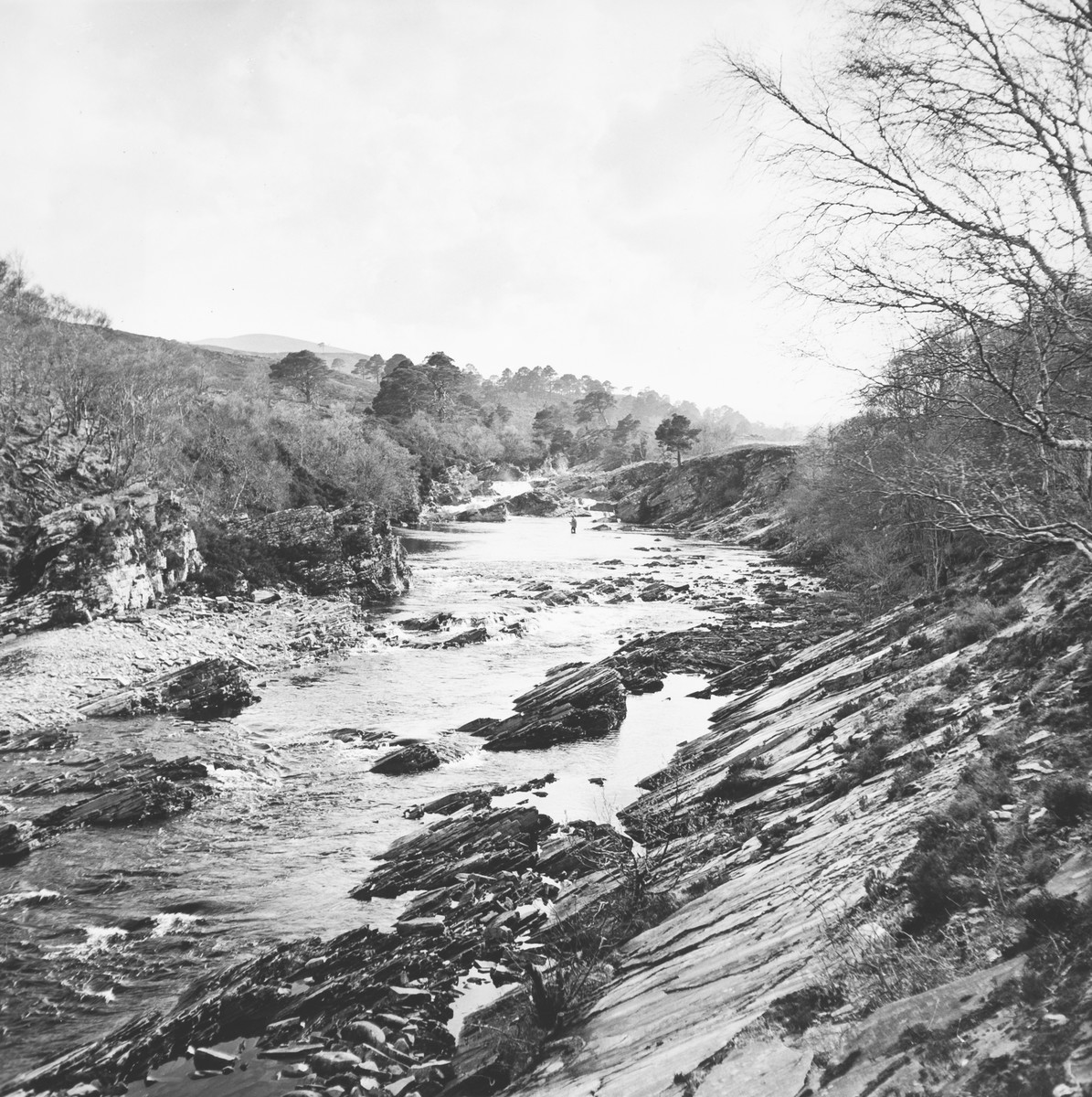 It's hard to see, but there's a fisherman in this photograph by John Tarlton on the River Einig, a Highland salmon fishing river.