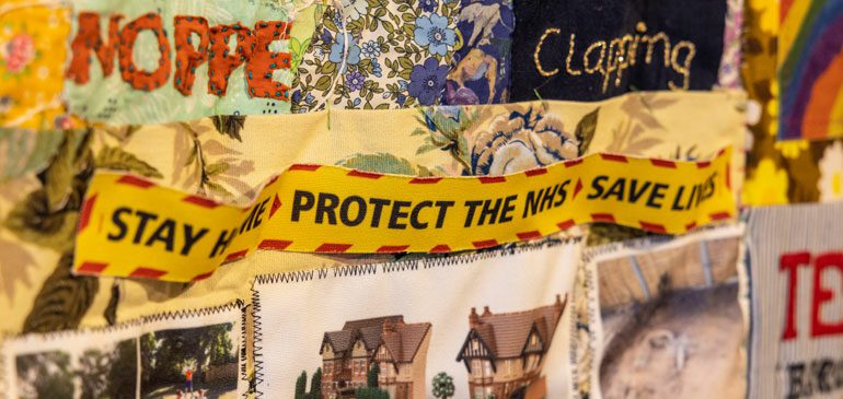 Detail of quilt made by The Rising Sun in The MERL COmmunity Voices display